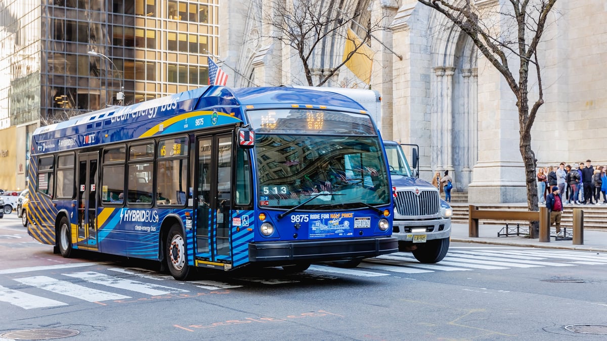Dreamline coach arriving in a city